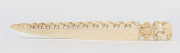 An Indian ivory letter opener with carved elephant decoration, 19th century, 21cm long