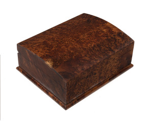 An amboyna timber fitted table box with hinged curved lid and fitted interior, 20th century, 8.5cm high, 21cm wide