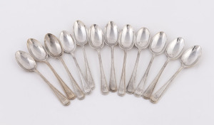 A set of twelve English sterling silver teaspoons by Mappin & Webb, circa 1909, 288 grams total.