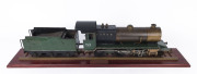 'DYAK' 2-6-0 LOCOMOTIVE AND TENDER: 2.5 inch gauge model of c.1938 steam locomotive built to LBSC design, copper boiler and fittings including water and pressure gauges, length (with tender) 80cm, weight 13kg; accompanied by a wooden display board with tr