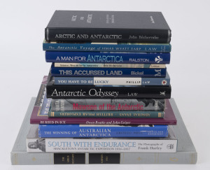 POLAR EXPLORATION: A shelf of books, mainly hardcover with d/jackets, including