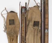 Two vintage fishing rods by HARDY'S, one for trout the other for salmon, both in original canvas carrying pouches, one rod with 2 tips, the other with 4 tips, early 20th century, pouches 150cm long - 2