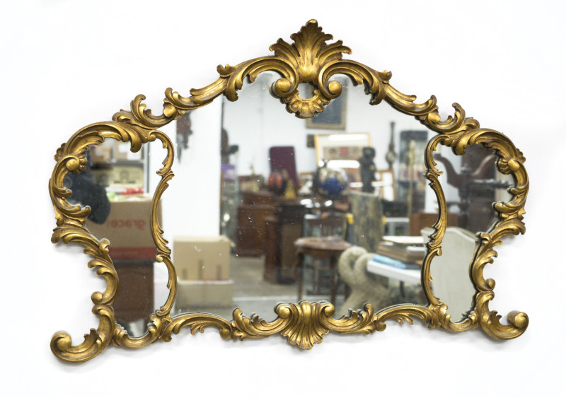 An Italian ornate gilt framed mirror, 20th century, ​73 x 110cm