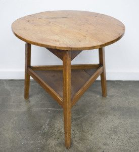 An antique cricket table, elm, circa 1900, 70cm high, 74cm diameter