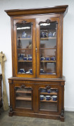 An antique English mahogany bookcase with fully glazed doors top and bottom, circa 1865, 240cm high, 136cm wide, 48cm deep