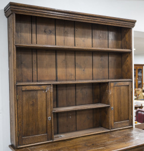 An antique French provincial dresser top with two cabinet doors, oak and pine, 19th century, 123cm high, 143cm wide, 18cm deep