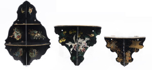 Three Papier Mache lacquer work folding corner shelves, 1 Japanese with a gilt fishing scene and 2 French with floral transfer decoration and simulated green tortoise shell ground with orchid decoration, circa 1900, (3 items), the largest 42cm high,19cm deep