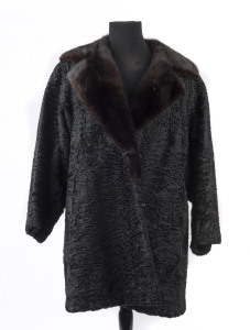 A Persian lamb-wool and fur three-quarter length jacket by "Theodore Furs of Melbourne" with black satin lining, concealed slash pockets. 