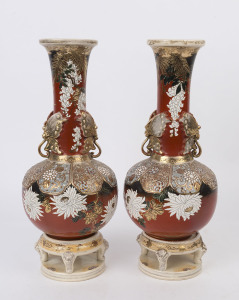 A pair of Japanese Satsuma export ware vases with stands, Meiji period, circa 1895, ​48cm high