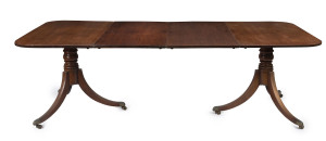 A Georgian mahogany two leaf extension dining table on twin pedestal base, early 19th century, 71cm high, 126cm wide (extends to 230cm), 109cm deep