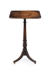A Georgian mahogany wine table with finely turned column, sabre legs resting on brass ball feet, early 19th century, 70cm high, 40cm wide, 35cm deep