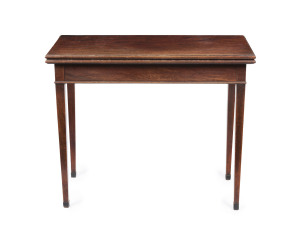 A Georgian mahogany fold-over tea table with square tapering legs, circa 1800, 75cm high, 91cm wide, 44cm (extends to 88cm) deep