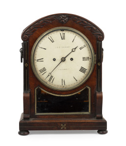 An antique English bracket clock, twin train fusee movement in a fine carved mahogany case, circa 1830, movement and dial signed "G. B. PATERSON, LONDON", with key and pendulum, 42cm high