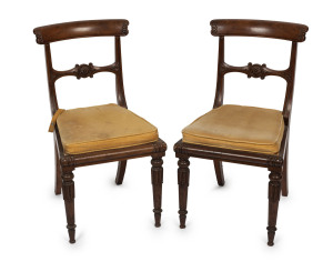 A fine pair of antique mahogany spade back dining chairs with rush seats, circa 1820