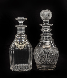 Two Georgian crystal decanters, early 19th century, 25cm and 28cm high