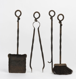 A set of five hand-wrought iron fire tools, circa 1930, ​60cm long