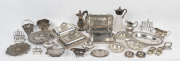 A collection silver plated table ware including tureens, claret jug, coasters, toast racks, chocolate pot etc. 19th and 20th century, (29 items).