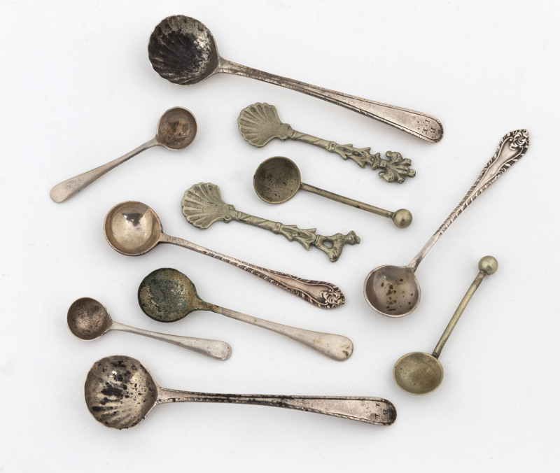 Eleven assorted mustard and salt spoons, silver and silver plate, 18th, 19th and early 20th century. Of note, a fine pair of feathered edge Georgian sterling silver mustard spoons (marks rubbed).