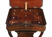 An antique English mahogany work table, lift-top revealing numerous lidded compartments with whale bone handles, finely fluted column and carved claw feet, circa 1830, ​77cm high, 47cm wide, 38cm deep - 2