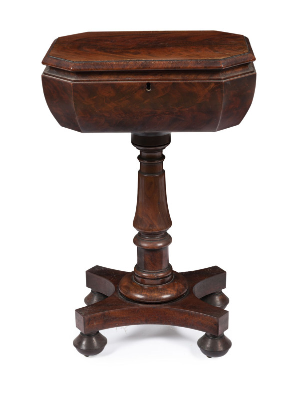 A Georgian mahogany teapoy, lift-top with twin caddy compartments and two mixing bowls, circa 1800, ​74cm high, 47cm wide, 36cm deep