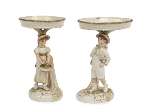 ROYAL WORCESTER pair of figural table comports with young boy and girl, late 19th century, green factory mark to base with additional impressed mark, 19cm high, 15cm wide