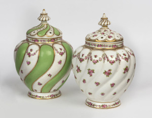 A pair of English porcelain potpourri vases, made for Harrods of London, early 20th century, both missing internal lids, 17cm high