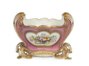 An antique English float bowl, adorned with two hand-painted floral vignettes on pink ground with gilded highlights, early 19th century, 18cm high, 24cm wide