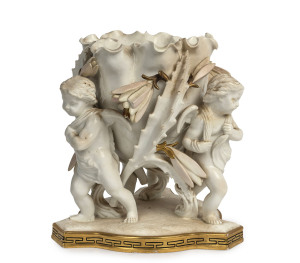 MOORE BROTHERS figural floral vase with three cherubs, 19th century, pink factory mark to base, 21cm high
