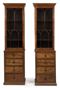 A rare pair of antique English Hepplewhite mahogany bookcases, 18th century, unusual slim proportions with flame mahogany drawer fronts, cockbeading and astragal glazed doors with adjustable shelving. With accompanying documentation from Windsor Antiques, dated October, 1963 dating and describing the pieces. 198cm high, 57cm wide, 36cm deep