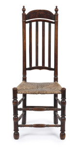 An antique provincial English high back chair, elm and pine with woven rush seat, late 18th century, 116cm high