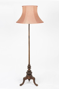 An antique carved walnut standard lamp and shade, 177cm high overall