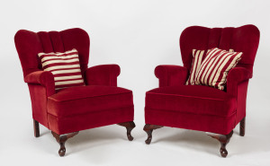 A pair of red velvet upholstered armchairs with cabriole legs, mid 20th century, 69cm across the arms