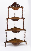 An antique corner four tier wotnot, burr walnut with marquetry inlay and barley twist columns, circa 1885, 118cm high, 63cm wide, 35cm deep