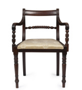 An antique English mahogany carver chair with barley twist rail back and fine ring turned legs, circa 1815, 58cm across the arms