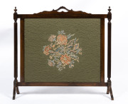 A tapestry front carved mahogany firescreen, early to mid 20th century, 89cm high, 96cm wide, 20cm deep