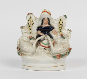 STAFFORDSHIRE figure group of a seated lady and swans, circa 1840, 13cm high