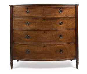 A fine Georgian mahogany bow front chest of five drawers with cockbeaded detailing, reeded edge and fluted columns, early 19th century, ​105cm high, 109cm wide, 59cm deep