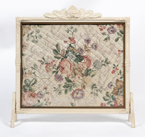 A vintage hand-made firescreen with white painted finish and floral insert panel, 20th century , 80cm high, 80cm wide