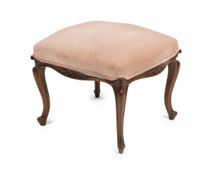 An antique footstool, carved walnut with cabriole legs and dusty pink upholstery, circa 1875, 47cm high, 62cm wide, 56cm deep