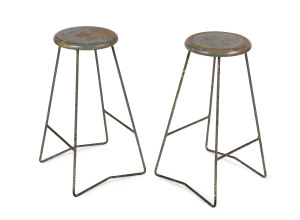 A pair of vintage bar stools, wrought iron with timber seats, mid 20th century, 60cm high, the seat 26 cm diameter