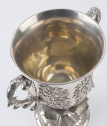 A Chinese Export Silver two-handled presentation cup, with embossed flowers and raised on a shaped circular base with a band of acanthus leaves. By CUTSHING, 8 New China Street, Canton, circa 1853, 26.5cm high, 1630gms. - 8