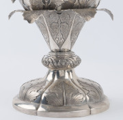 A Chinese Export Silver two-handled presentation cup, with embossed flowers and raised on a shaped circular base with a band of acanthus leaves. By CUTSHING, 8 New China Street, Canton, circa 1853, 26.5cm high, 1630gms. - 9