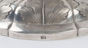 A Chinese Export Silver two-handled presentation cup, with embossed flowers and raised on a shaped circular base with a band of acanthus leaves. By CUTSHING, 8 New China Street, Canton, circa 1853, 26.5cm high, 1630gms. - 10