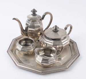 A German silver five piece tea and coffee service including tray, early 20th century, stamped "835" with crown and crescent mark, the tallest 16cm high, 1180 grams