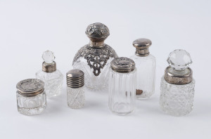 Group of seven assorted sterling silver and crystal vanity bottles, 19th and early 20th century, ​the largest 11cm high