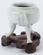 Blanc de chine three legged pot on carved timber stand, 19th/20th century, 13.5cm high overall - 5