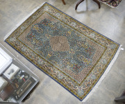 Qum Persian hand-woven silk rug, 170 x 110cm