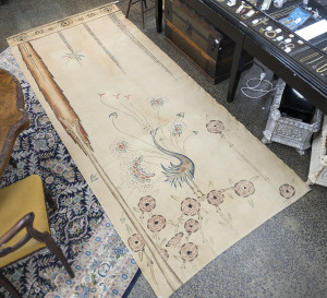 ARTS & CRAFTS linen wall-hanging with screen printed design featuring a stylized peacock surrounded by flowers and foliage, English, circa 1910, 305 x 127cm.