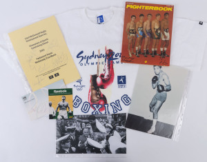 Boxing assortment with 3 photos of Lionel Rose incl. press photo of him being held shoulder high after defeating Harada to become WBC/WBA bantamweight champion, c.1972 issue of "Fighterbook" magazine signed by Henry Nissen & Tony Mundine; Jeff Fenech signatures (2) on Barcelona 1992 envelope or on Reebok sticker, Barry Michael signature on piece, Sydney Olympics boxing teeshirt, 2001 Aboriginal Youth Fundraising Dinner programme piece with signatures incl. Tony Mundine & Evonne Goolagong, etc.