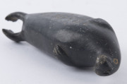 A Canadian Inuit greenstone carving in the form of a walrus, signed and numbered to the base, 20th century, 12cm long - 4